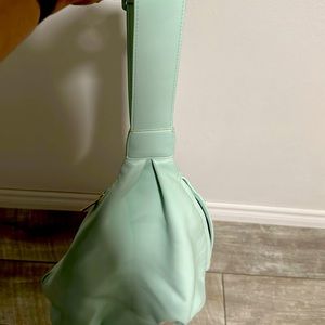 Mint green one shoulder backpack